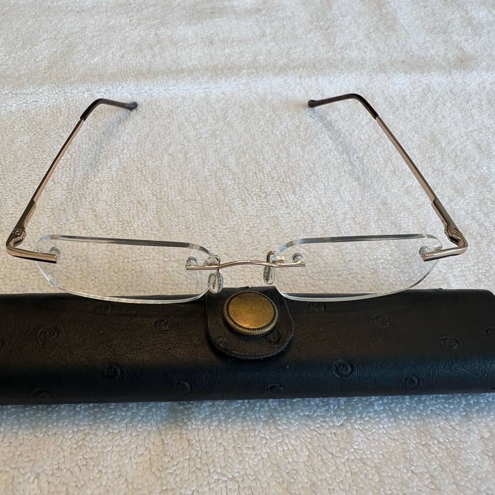 Rimless readers slim line w Ostrich case and snakeskin case +1.5 reading glasses